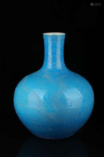 Peacock blue globular shape vase with carved dragon pattern