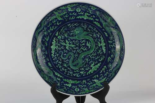 Qing Kangxi blue and white peacock green dragon dish