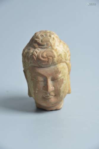 A carved stone Buddha's head