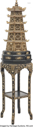 A Chinese Carved Wood and Lacquer Pagoda Lamp on