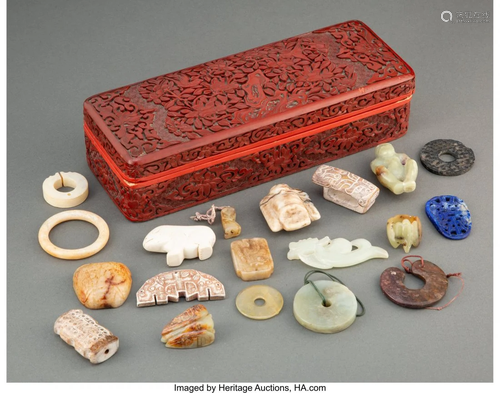 A Chinese Cinnabar Lacquer Box with a Group of A