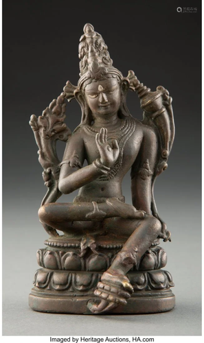 A Tibetan Silver Inlaid Copper Alloy Figure of M