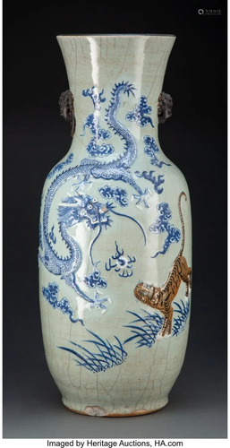 A Chinese Celadon Ground Dragon and Tiger Vase,