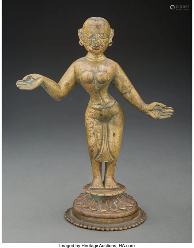 An Indian Bronze Dancer 9-1/8 x 6-7/8 x 3-3/4 in