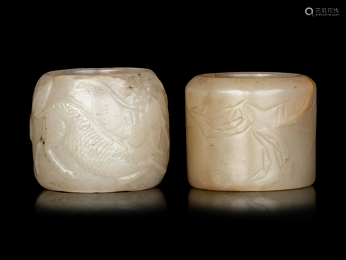 Two Carved Celadon Jade Archer's Rings