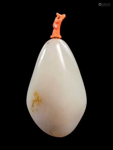 A White Jade Pebble-Form Snuff Bottle