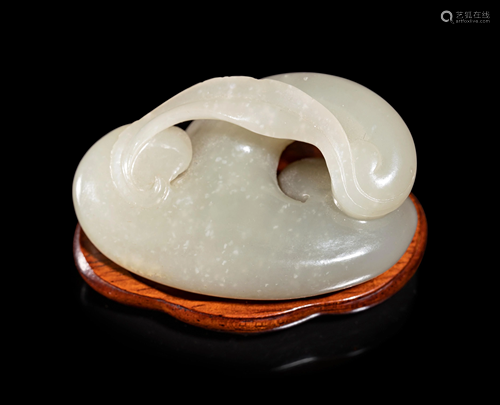 A Pale Celadon and Russet Jade Carving of a Lingzhi