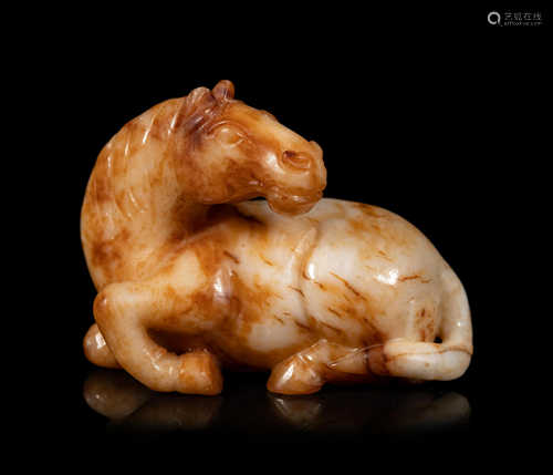 A Yellow Jade Figure of Recumbent Horse