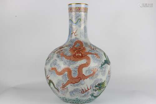 A Qianlong famille-rose famille-rose dragon vase with gold-p...