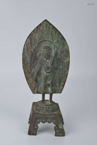 Bronze backlit Buddha statue