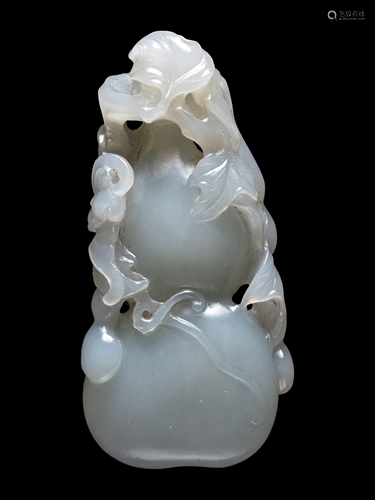 A Pale Celadon Jade Gourd-Form Pendant