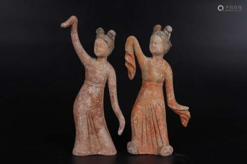 Pottery dancing figurine