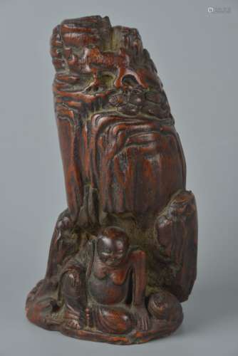 Bamboo carving with figure of a mountain