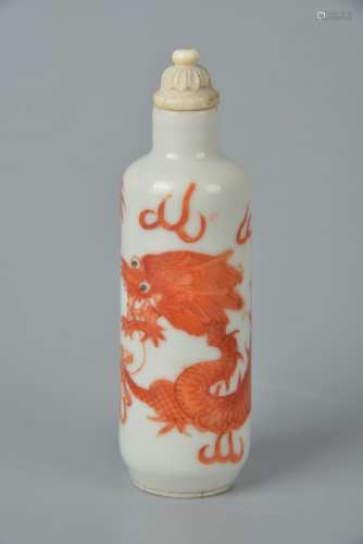 An alum-red glazed chi dragon snuff bottle