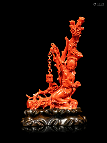 A Carved Red Coral Figure of a Female Immortal