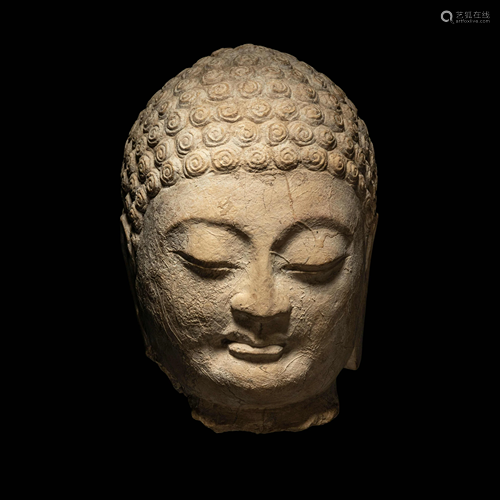 A Carved Stone Head of Buddha