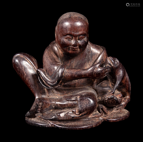 A Carved Zitan Wood Figural Group of Liu Hai and