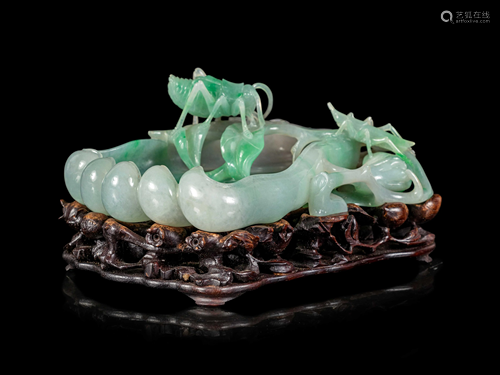 An Apple Green and White Jadeite 'Buddha's Hand Citron