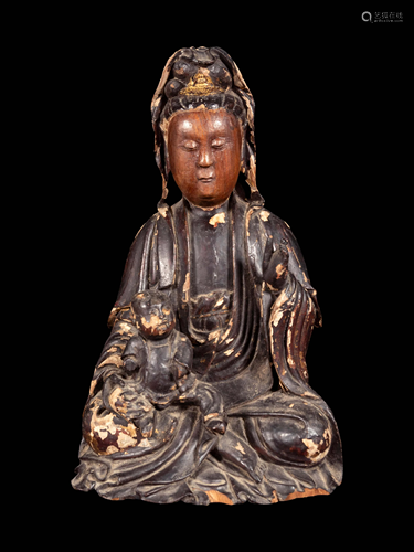 A Gilt Decorated Dark Brown Lacquered Wood Figure of