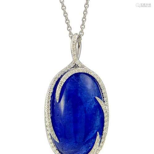 Pendentif en or blanc centré d'une importante Tanzanite Natu...