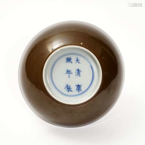 A purple-gold glazed bowl, Kangxi period, Qing Dynasty
清代康...