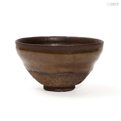 A Jian Kiln Persimmon Red Glazed Cup, Song Dynasty
宋代建窑柿...