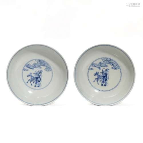 A pair of blue and white bowls with eight immortals pattern,...