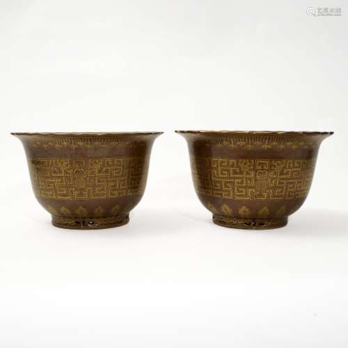 A pair of purple-gold glazed flower pots with gold traces, Q...
