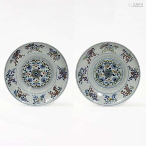 A pair of contrasting color discs with eight treasures, Qian...