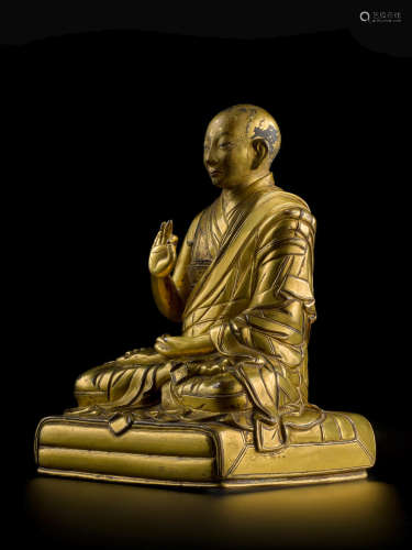 A GILT COPPER ALLOY FIGURE OF THE FIRST PANCHEN LAMA, LOBSAN...