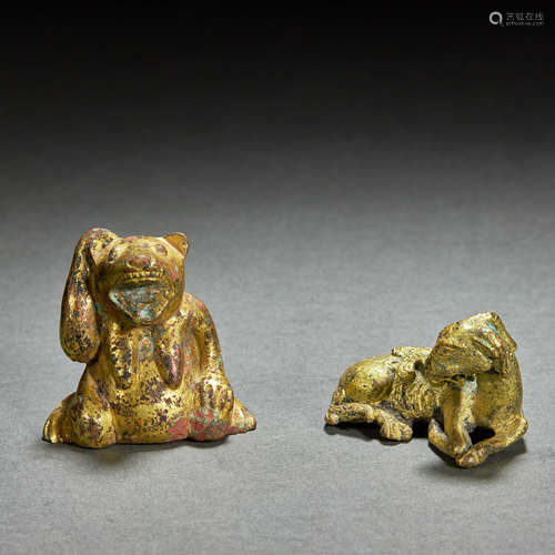 A PAIR OF GILT-BRONZE BEASTS