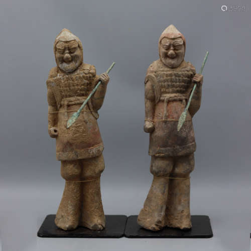 NORTHERN WEI DYNASTY,A PAIR OF PAINTED POTTERY WARRIORS