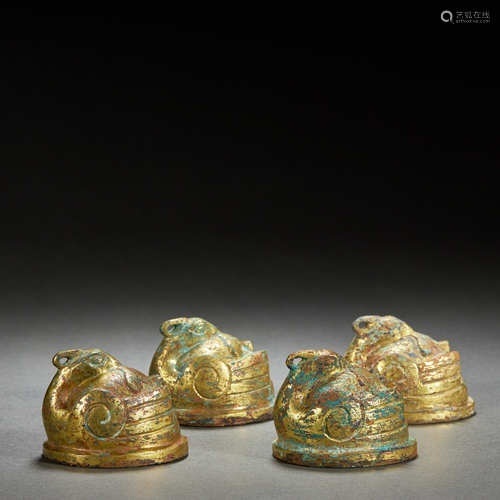 A SET OF GILT-BRONZE PHOENIX ORNAMENTS