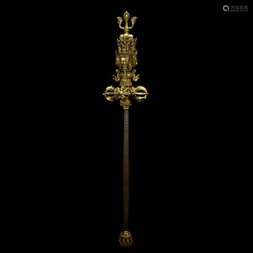 A LARGE GILT-BRONZE RELIGIOUS WEAPONS