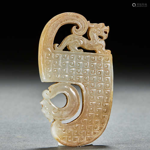 A JADE CARVED DRAGON PENDANT