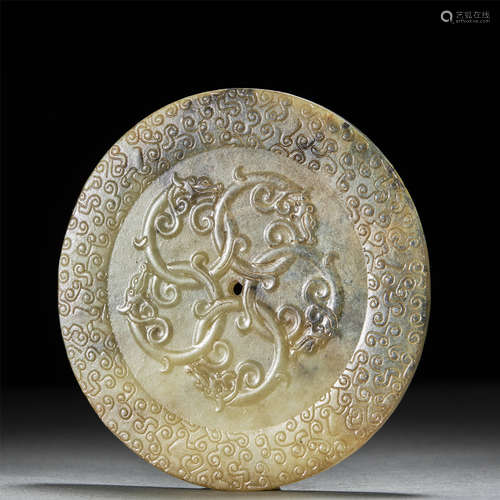 A JADE CARVED DRAGON DISH