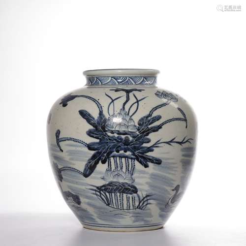 A BLUE AND WHITE GLAZED JAR