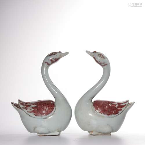 A PAIR OF UNDERGLAZE-RED PORCELAIN DUCKS