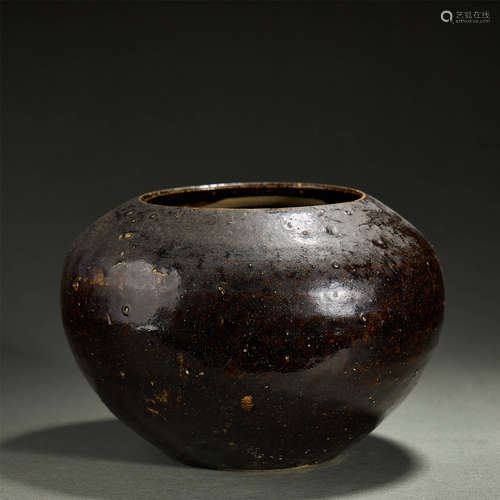 A BLACK PORCELAIN JAR