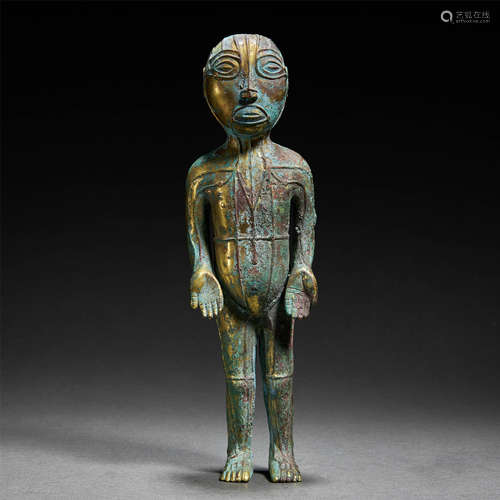 A RARE GILT-BRONZE FIGURE