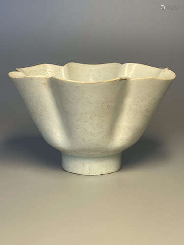 A CELADON-GLAZED BOWL