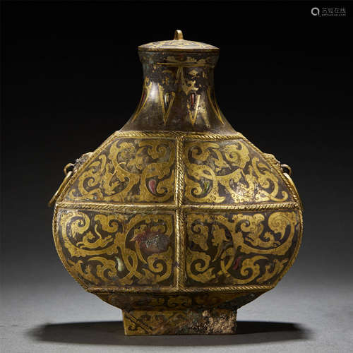 A PARCEL-GILT SILVER DRAGON WINE VESSEL