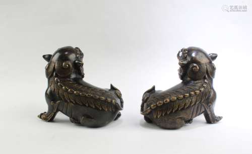 A Pair of Gilt Bronze Mythical Beast Statues
