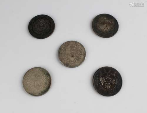 A Group of Five Chinese Silver Coins