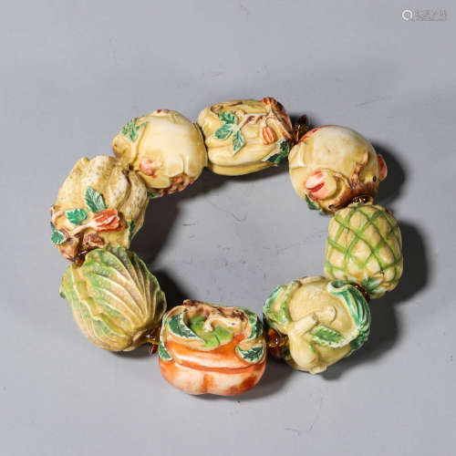 A Carved Fruit with Vegetable Bead Braclet