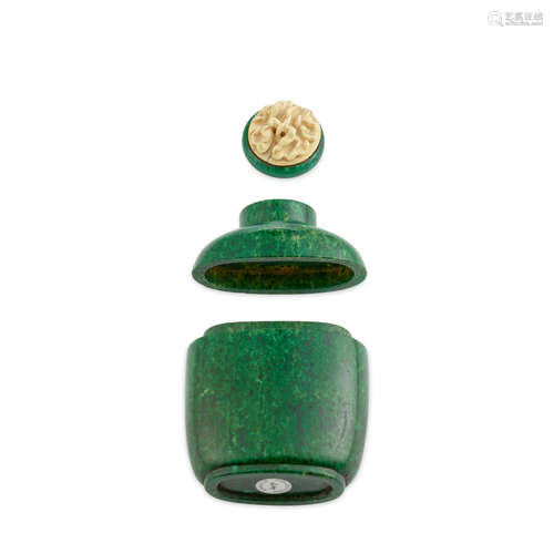 A RARE GREEN-STAINED WALRUS-TUSK TWO-PART SNUFF BOTTLE