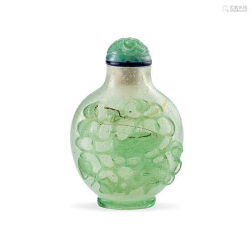 A Transparent pale green glass overlay bubble-suffused snuff...