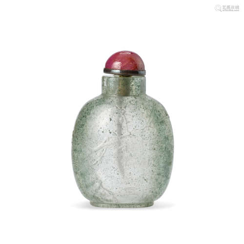 A rare moss-flecked inscribed rock crystal bottle