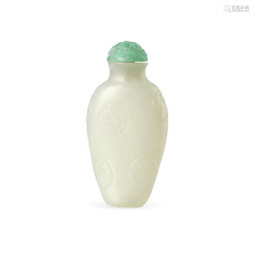 A White jade snuff bottle with floral medallions