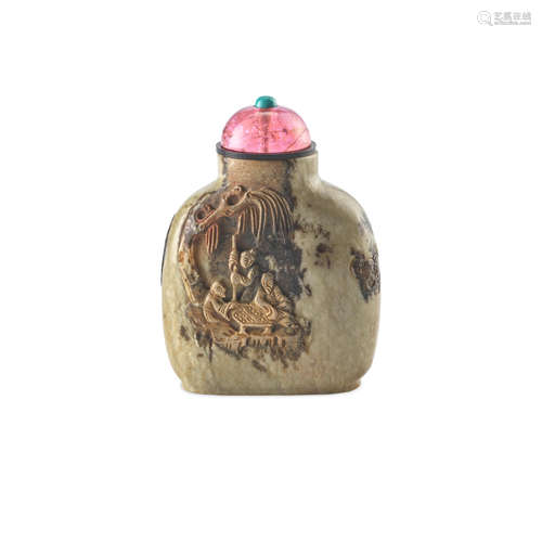 A Large carved russet and beige jade snuff bottle